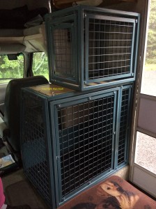 Custom home built set of 2 stacked dog crates in a RV.